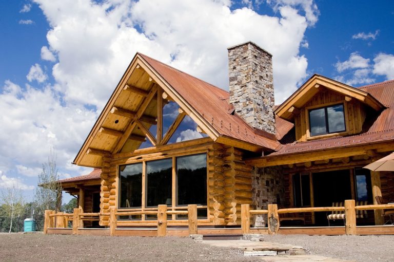 Wide View Log Cabin With Stone Chimney 768x510 