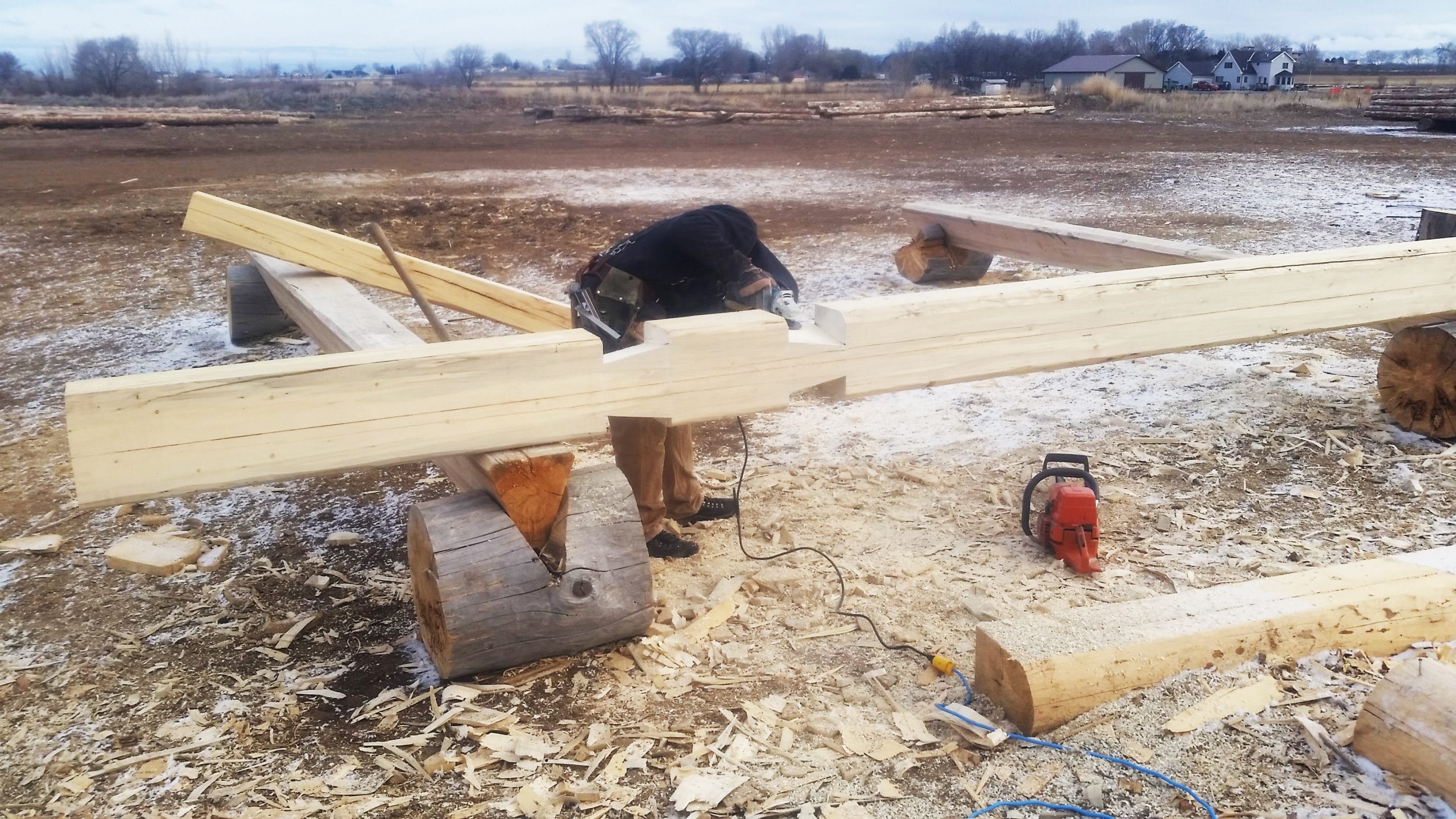 Log Cutting and Chipping Frontier Log Homes