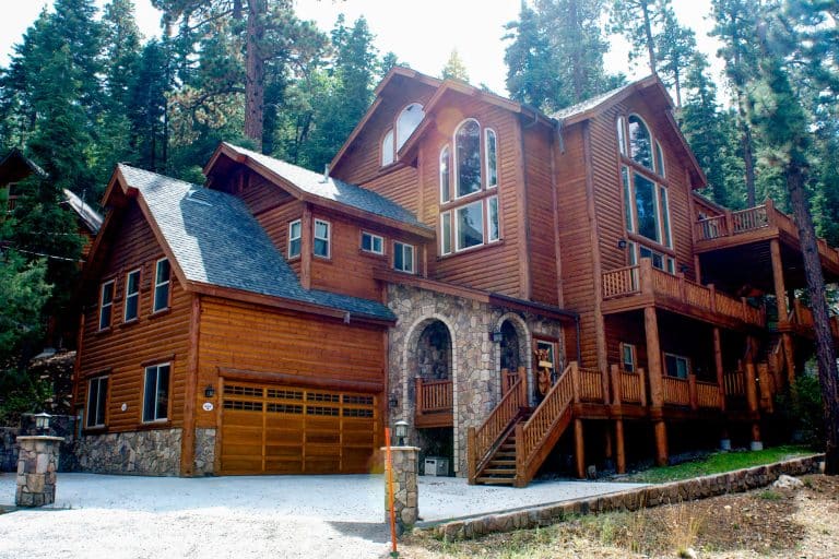 Hybrid log home design blending handcrafted logs, timber, and conventional construction — Frontier Log Homes