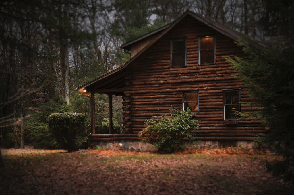 Diagram showing how log home walls settle and compress over time
