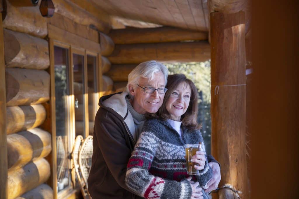 Log home security features protecting a mountain log home entry