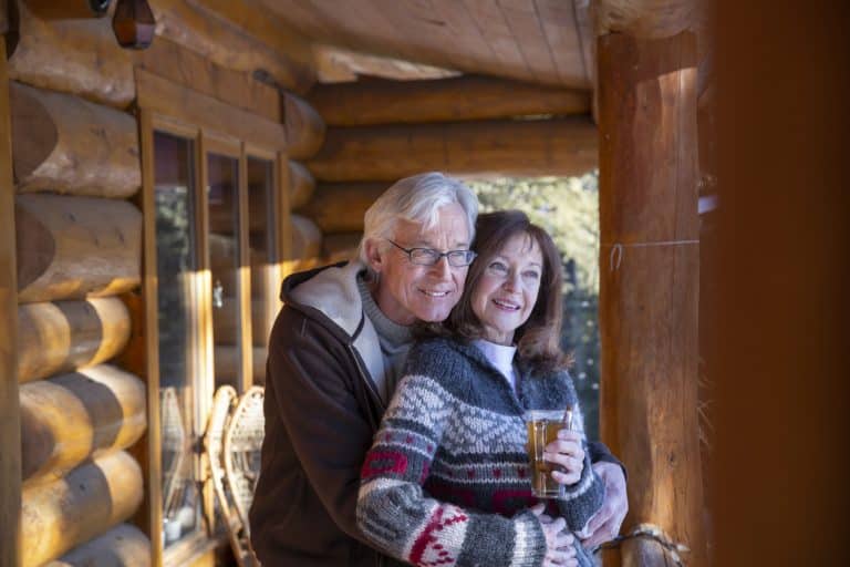 Log home security features protecting a mountain log home entry