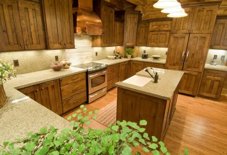 Log home kitchen and dining area in a custom build — photo 37
