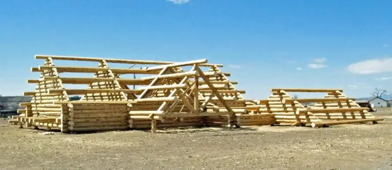 Custom log home under construction by Frontier Log Homes general contractor — photo 75