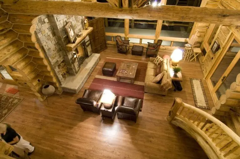 Log cabin interior of a handcrafted custom log home — photo 36