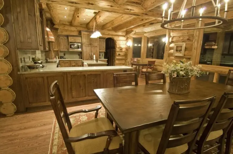 Log home kitchen and dining area in a custom build — photo 25
