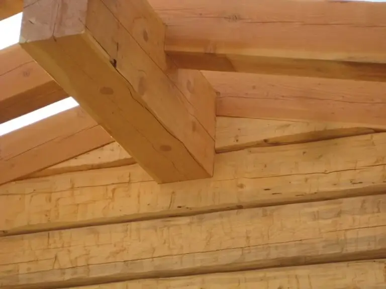 Custom log home under construction by Frontier Log Homes general contractor — photo 72