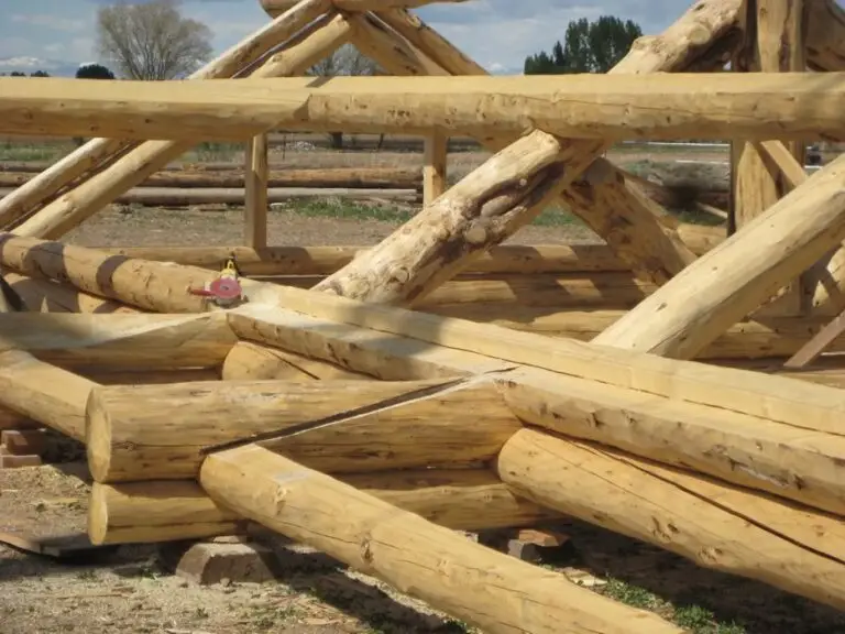 Custom log home under construction by Frontier Log Homes general contractor — photo 71