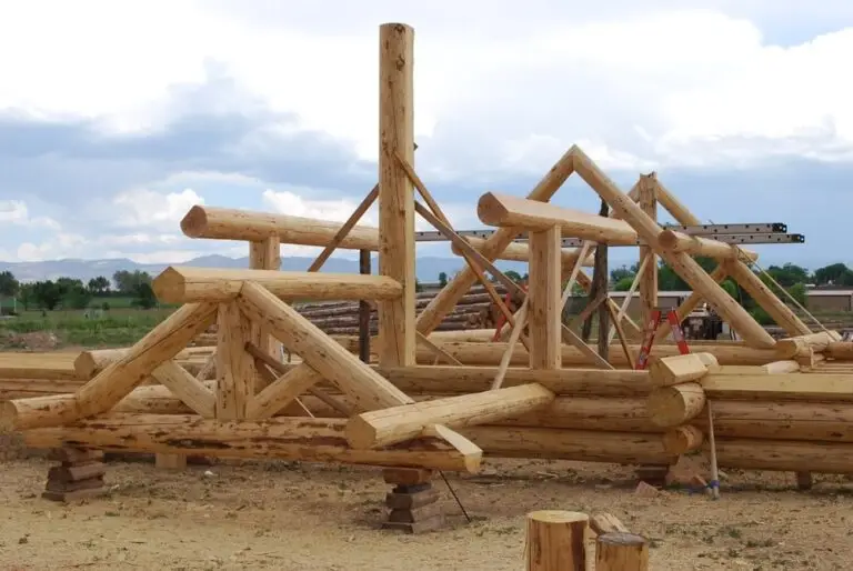 Custom log home under construction by Frontier Log Homes general contractor — photo 69