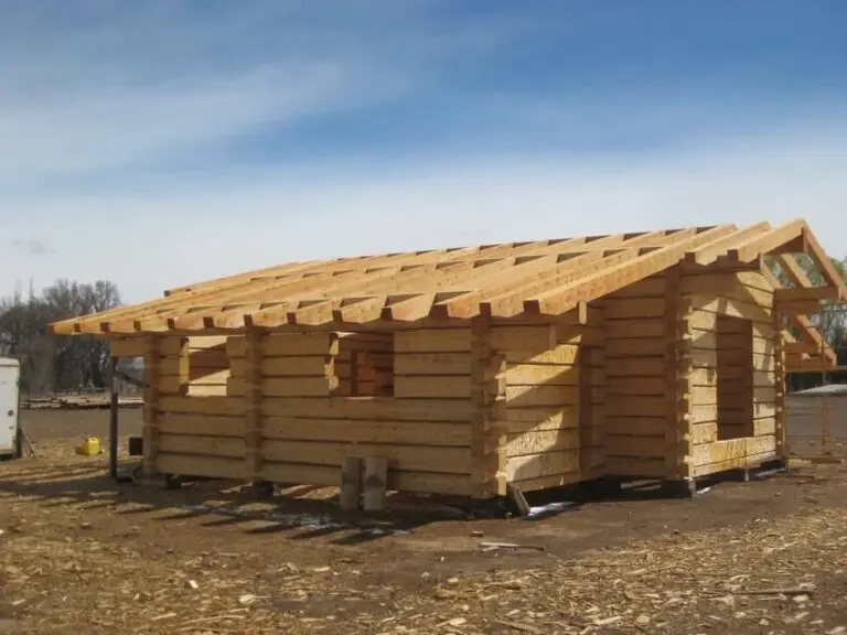 Custom log home under construction by Frontier Log Homes general contractor — photo 68
