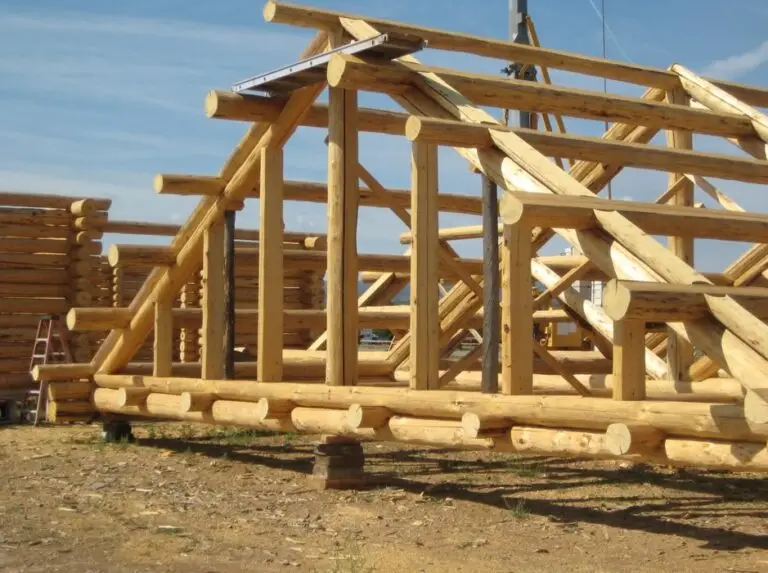 Custom log home under construction by Frontier Log Homes general contractor — photo 67