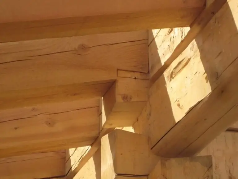 Custom log home under construction by Frontier Log Homes general contractor — photo 66