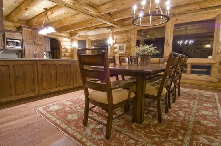 Log home kitchen and dining area in a custom build — photo 18