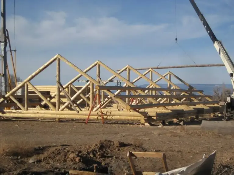 Handcrafted log trusses and componentry by Frontier Log Homes — photo 24
