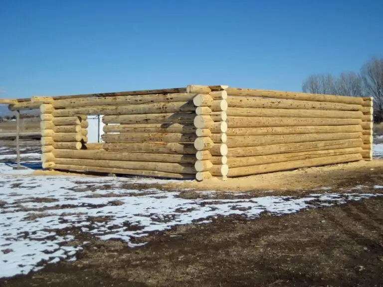 Custom log home under construction by Frontier Log Homes general contractor — photo 64