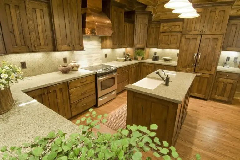 Log home kitchen and dining area in a custom build — photo 13