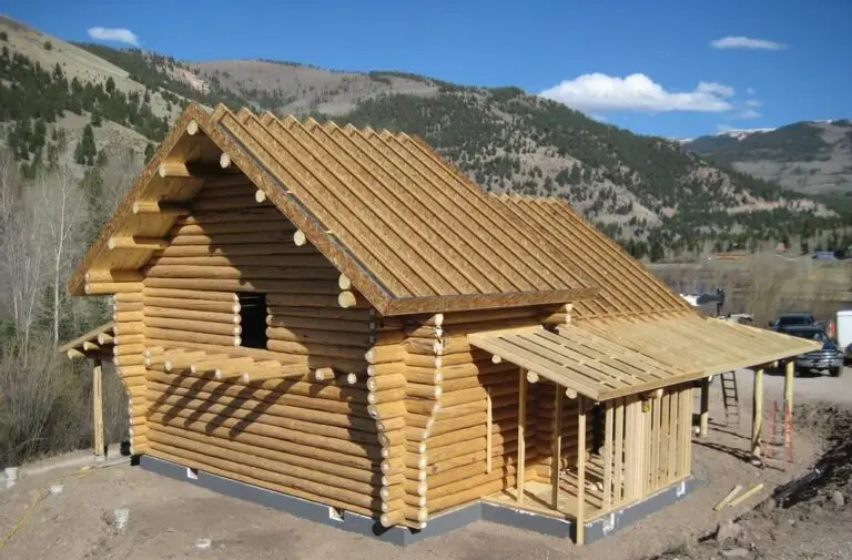 Custom log home under construction by Frontier Log Homes general contractor — photo 60