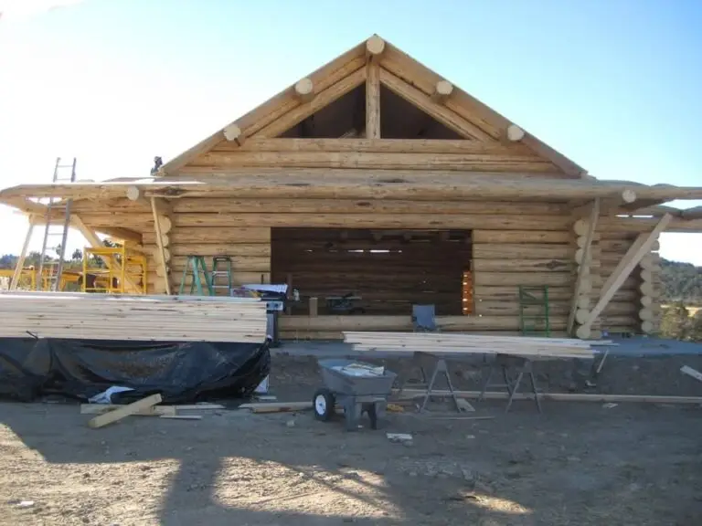 Custom log home under construction by Frontier Log Homes general contractor — photo 58