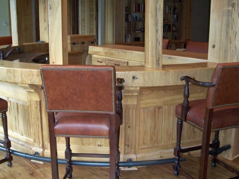 Log cabin interior of a handcrafted custom log home — photo 20