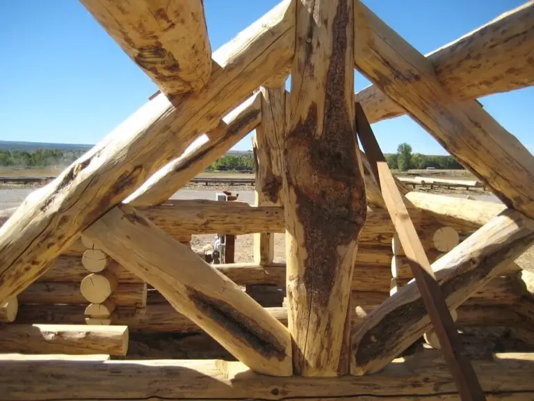 Custom log home under construction by Frontier Log Homes general contractor — photo 57