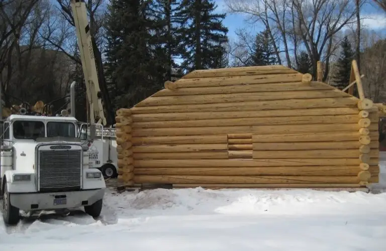 Custom log home under construction by Frontier Log Homes general contractor — photo 54