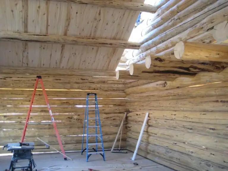 Custom log home under construction by Frontier Log Homes general contractor — photo 52