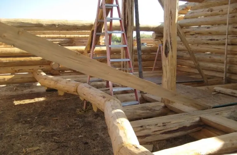 Custom log home under construction by Frontier Log Homes general contractor — photo 51