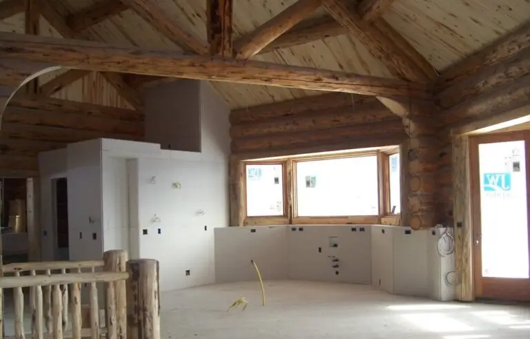 Custom log home under construction by Frontier Log Homes general contractor — photo 50