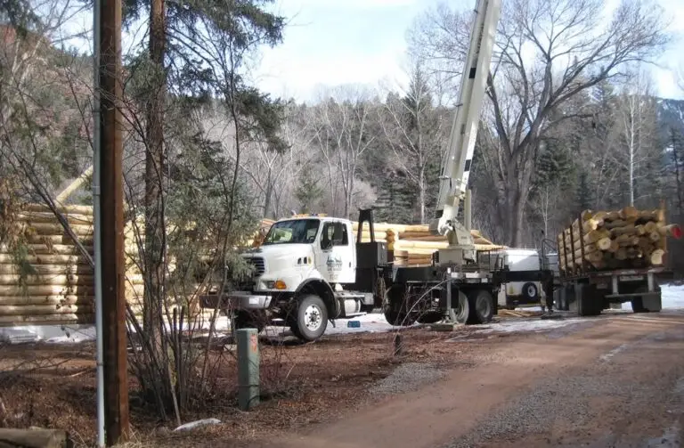 Custom log home under construction by Frontier Log Homes general contractor — photo 47