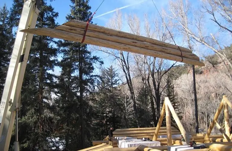 Custom log home under construction by Frontier Log Homes general contractor — photo 45