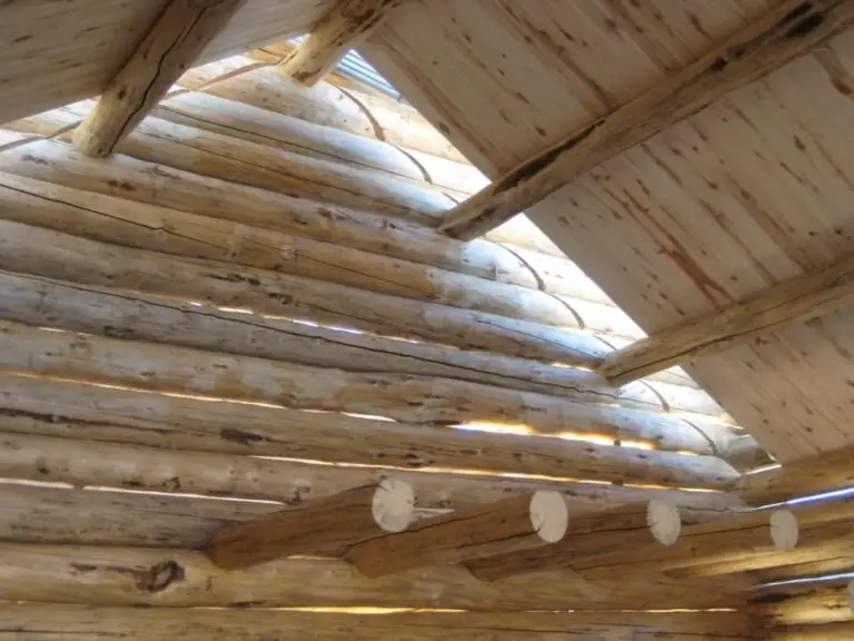 Custom log home under construction by Frontier Log Homes general contractor — photo 43