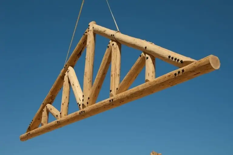 Handcrafted log trusses and componentry by Frontier Log Homes — photo 1