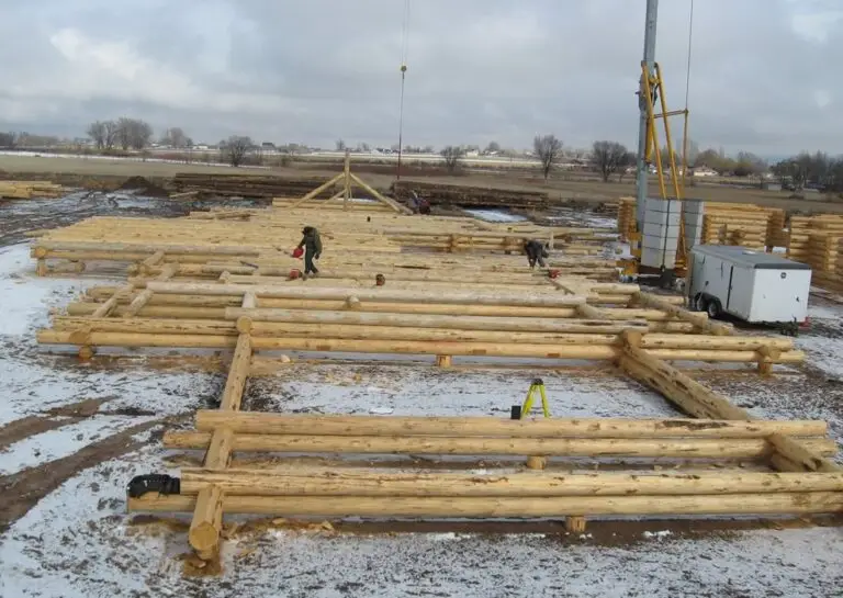 Custom log home under construction by Frontier Log Homes general contractor — photo 42