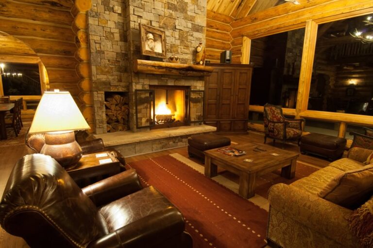Hybrid log homes interior — handcrafted log beams with conventional framing by Frontier Log Homes