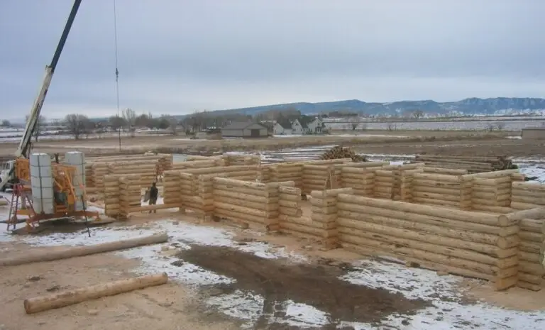 Custom log home under construction by Frontier Log Homes general contractor — photo 40