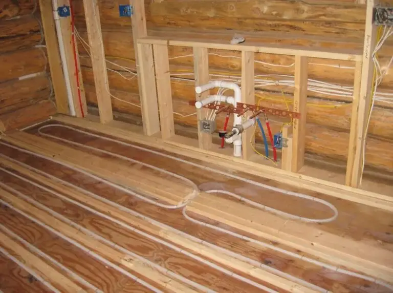 Custom log home under construction by Frontier Log Homes general contractor — photo 39