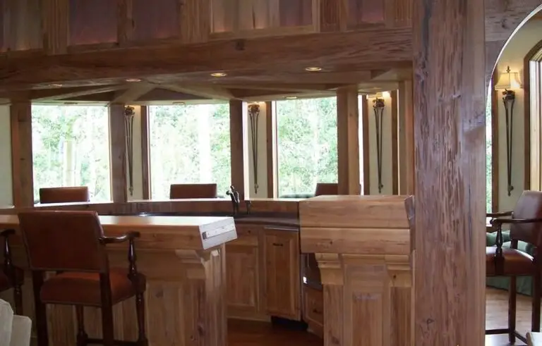 Log cabin interior of a handcrafted custom log home — photo 43