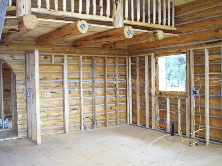 Custom log home under construction by Frontier Log Homes general contractor — photo 35