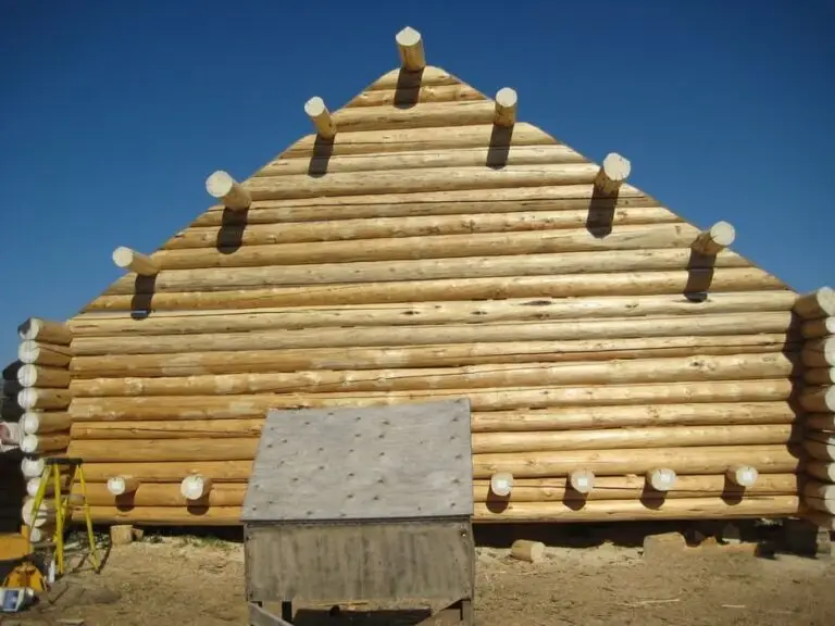 Custom log home under construction by Frontier Log Homes general contractor — photo 34
