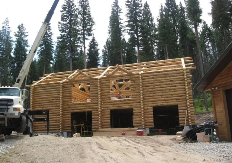 Custom log home under construction by Frontier Log Homes general contractor — photo 32
