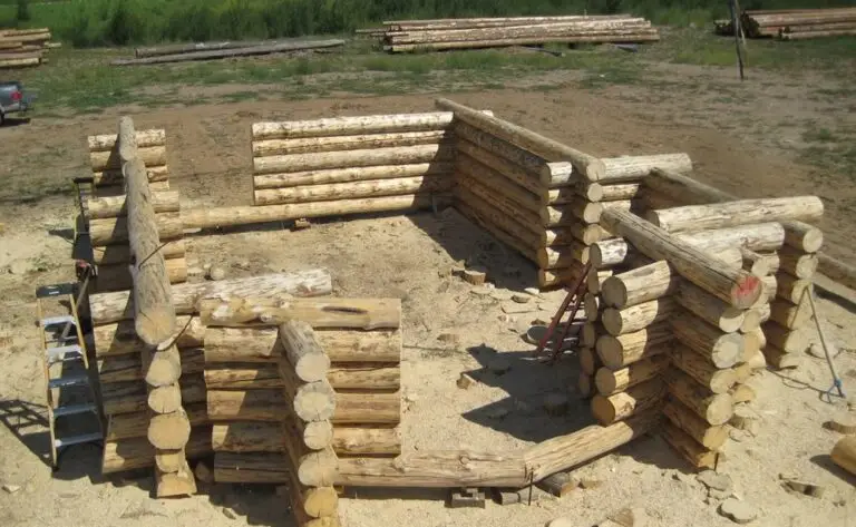 Custom log home under construction by Frontier Log Homes general contractor — photo 29