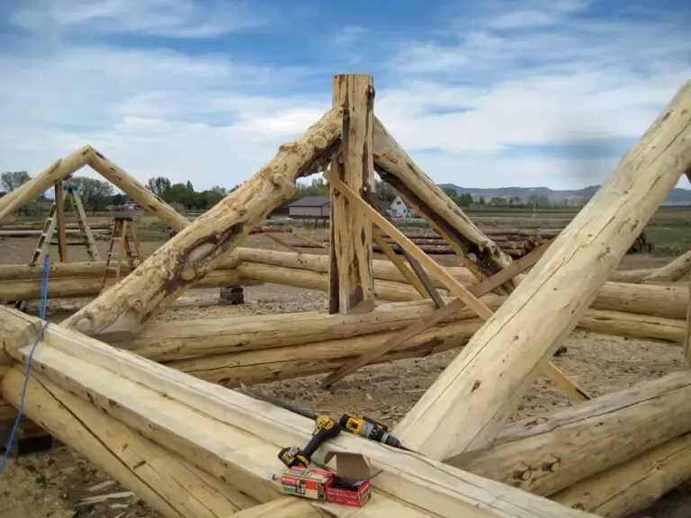 Custom log home under construction by Frontier Log Homes general contractor — photo 25