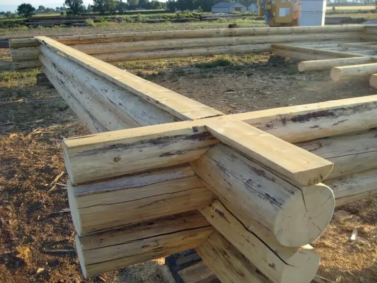 Custom log home under construction by Frontier Log Homes general contractor — photo 24