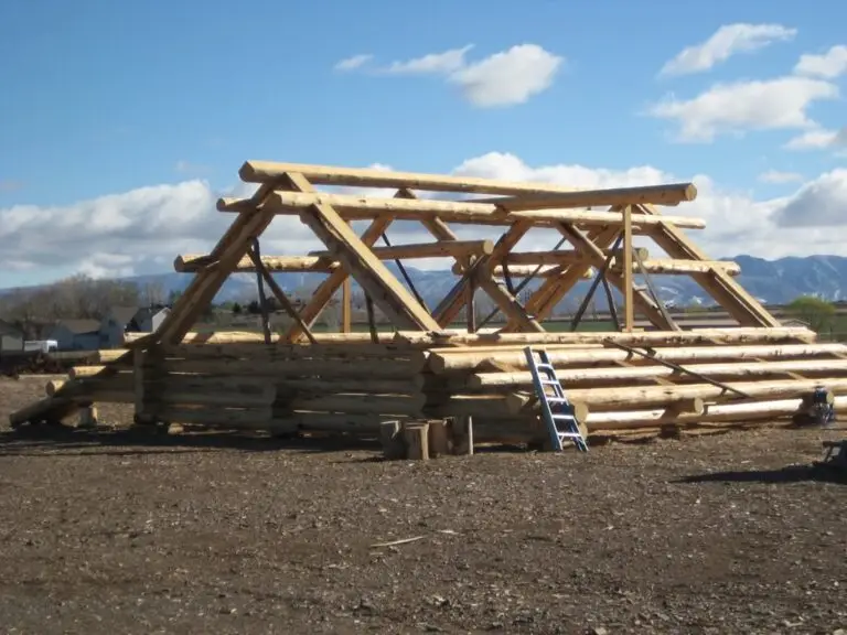 Custom log home under construction by Frontier Log Homes general contractor — photo 78