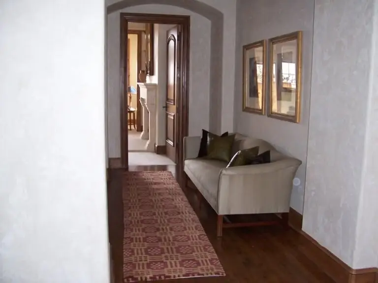 Log cabin interior of a handcrafted custom log home — photo 41