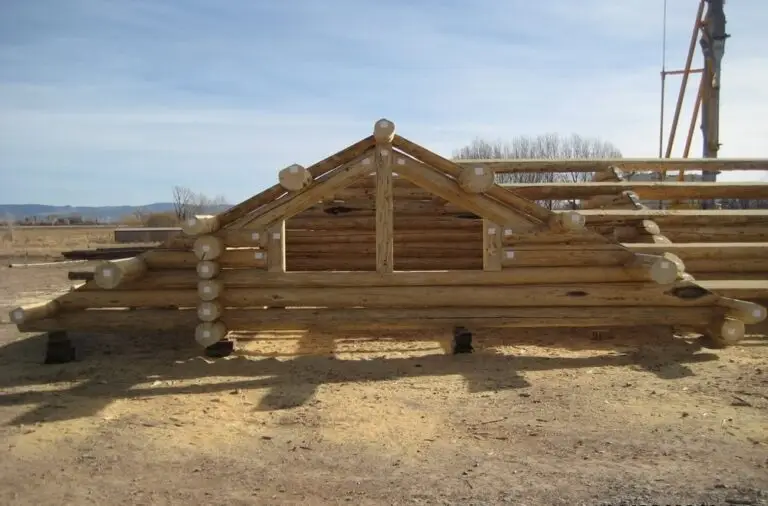 Custom log home under construction by Frontier Log Homes general contractor — photo 14
