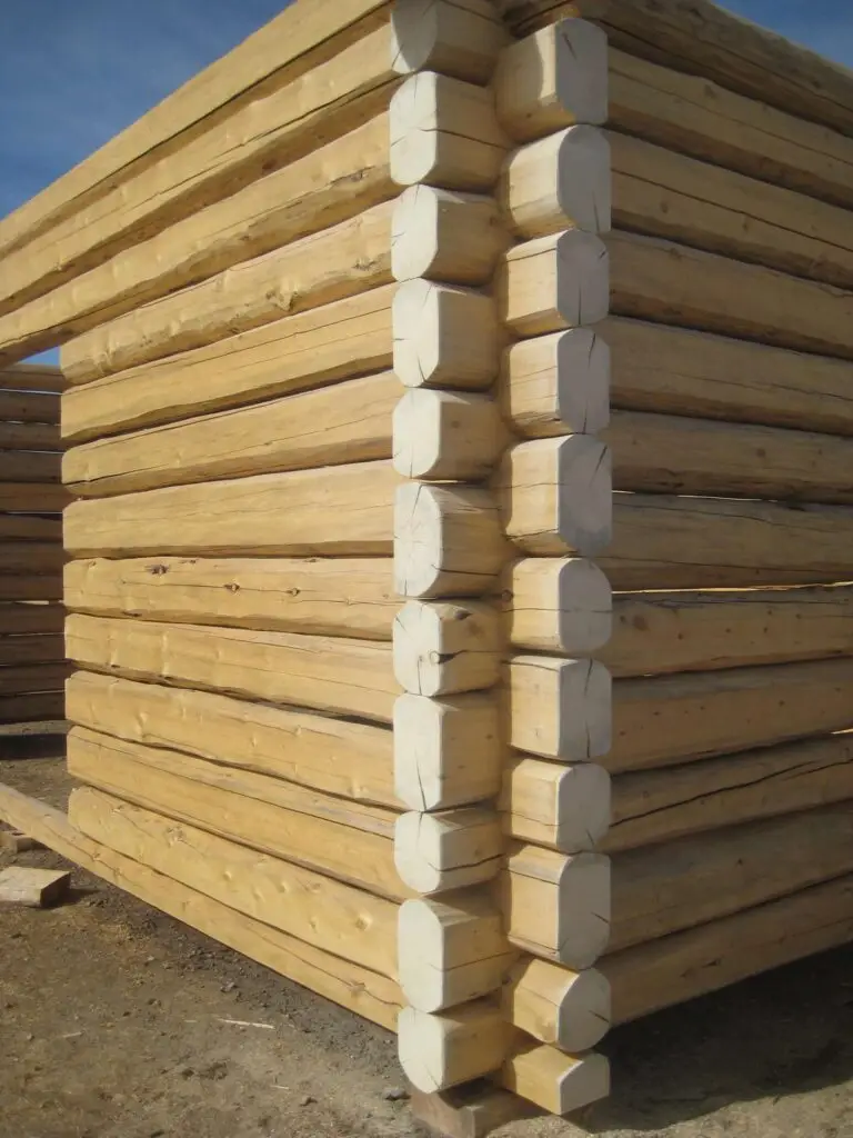Frequently asked questions about log homes — handcrafted log wall by Frontier Log Homes
