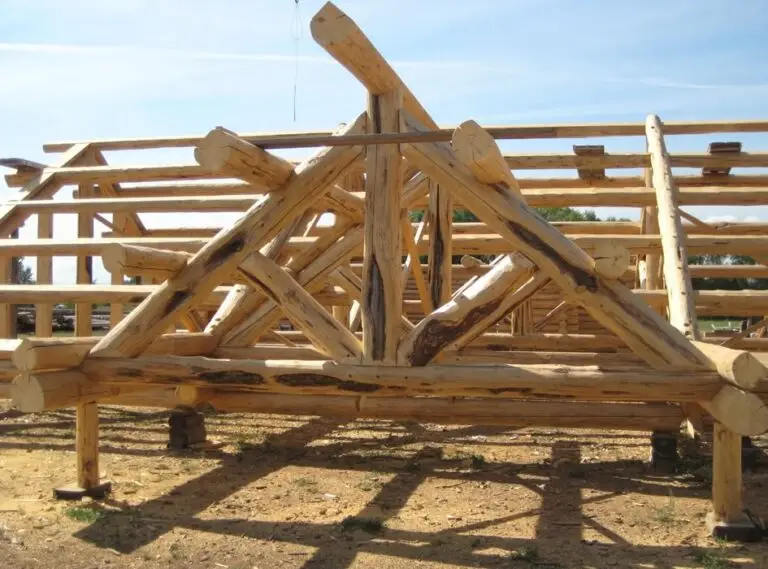 Custom log home under construction by Frontier Log Homes general contractor — photo 77
