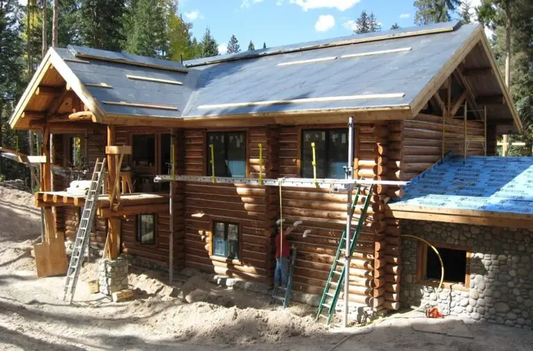 Custom log home under construction by Frontier Log Homes general contractor — photo 3
