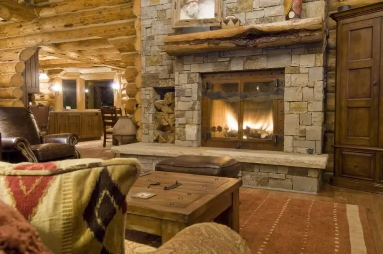 Log cabin interior of a handcrafted custom log home — photo 39